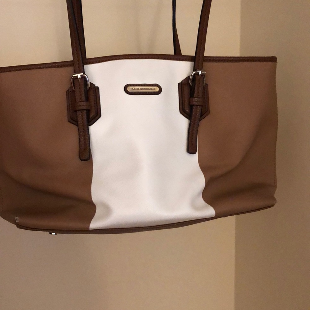 Brown and white leather purse